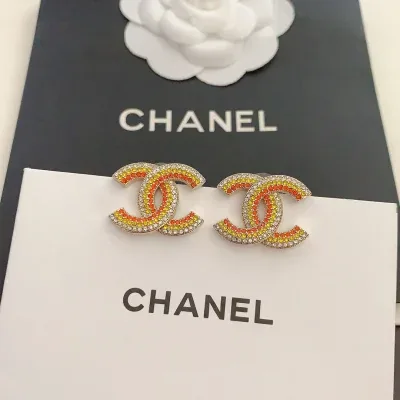 Boucles d'oreilles Chanel CC tricolores