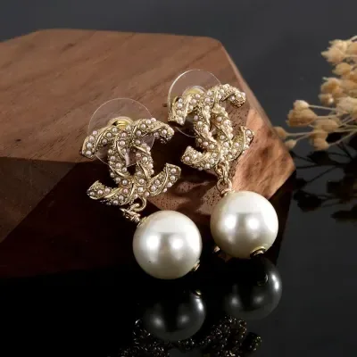 Boucles d'oreilles Chanel Pearl Double C