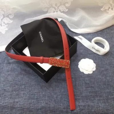 Ceinture Chanel orange, boucle signature, métal doré, 30 mm