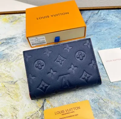 Portefeuille Louis Vuitton en cuir de vachette pleine fleur embossé, noir, avec fermeture éclair