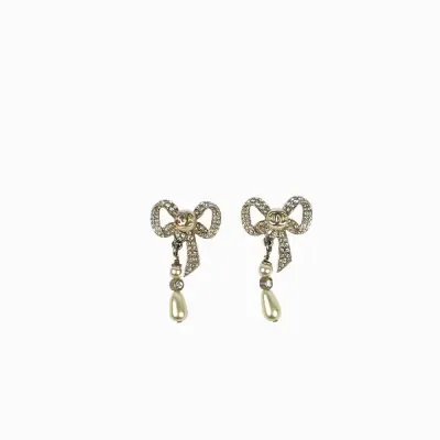 Boucles d'oreilles Chanel Ribbon en argent et pierres