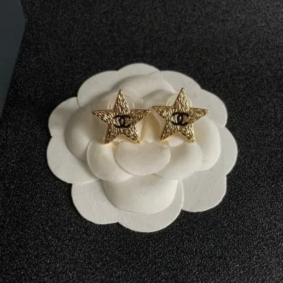 Boucles d'oreilles étoiles Chanel effet lave